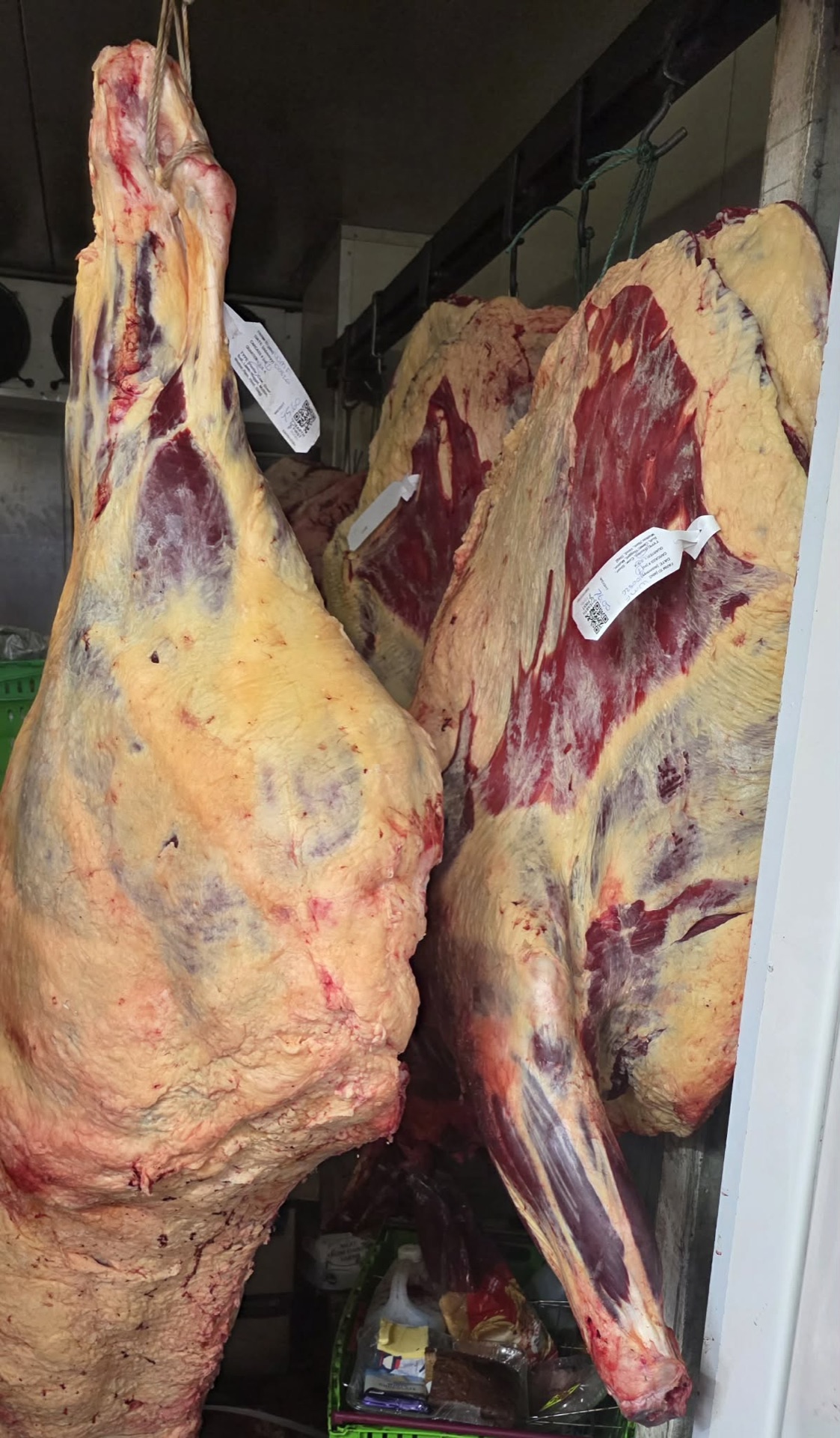 Beef sides hanging in the De Bauchery chiller ready for cutting